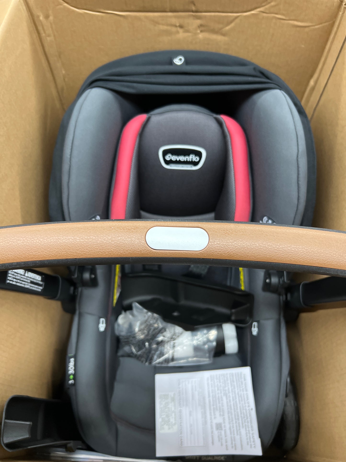 Evenflo Shyft DualRide with Carryall Storage Infant Car Seat and Stroller Combo (Sylva Pink)