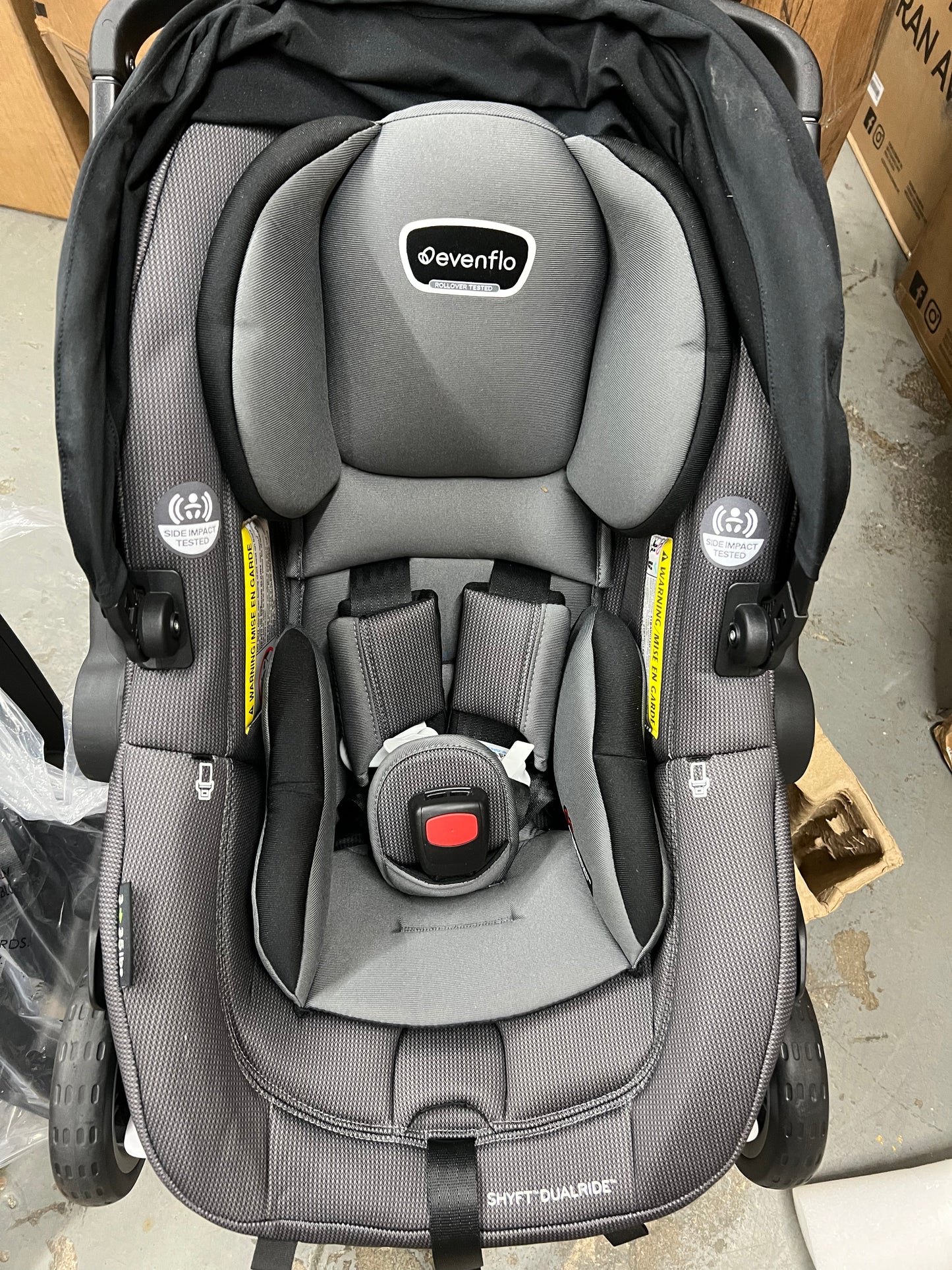 Evenflo Shyft DualRide with Carryall Storage infant car seat and stroller combo Travel System BOONE GRAY