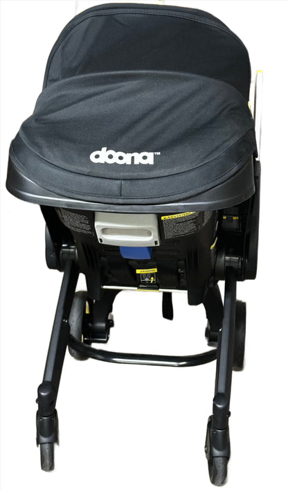 Doona Infant Car Seat & Latch Base, Rear Facing, Car Seat to Stroller in Seconds, Nitro Black (07/23)